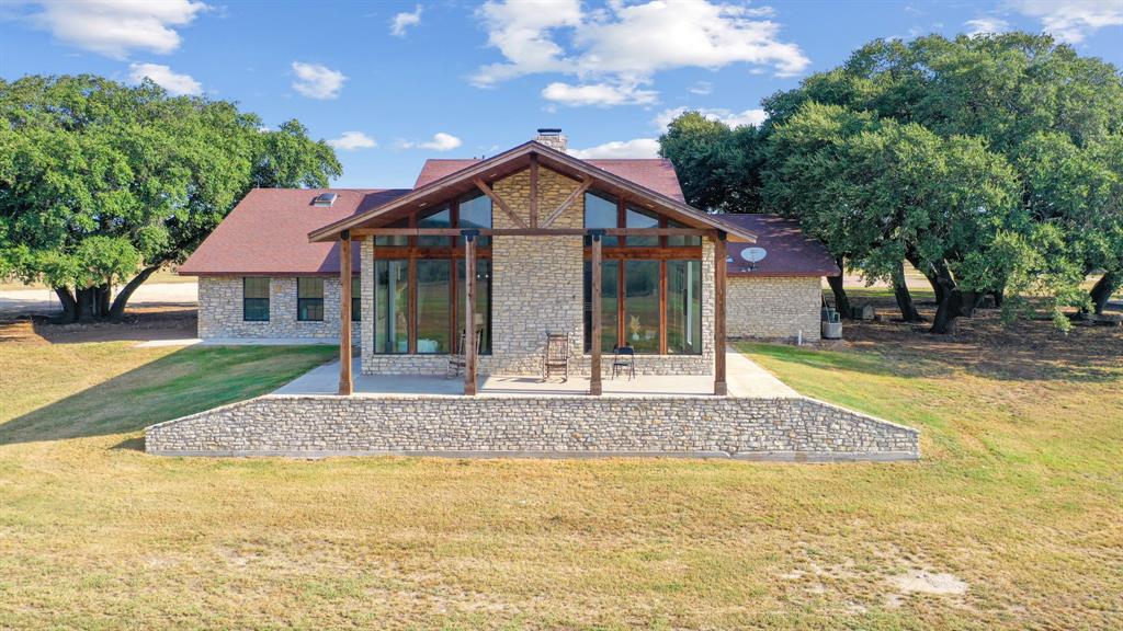 2296 County Road 290 Dublin, TX 76446 - Photo 2 of 40 a view of a house with a swimming pool
