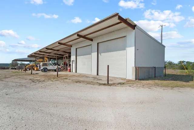 a view of garage and deck