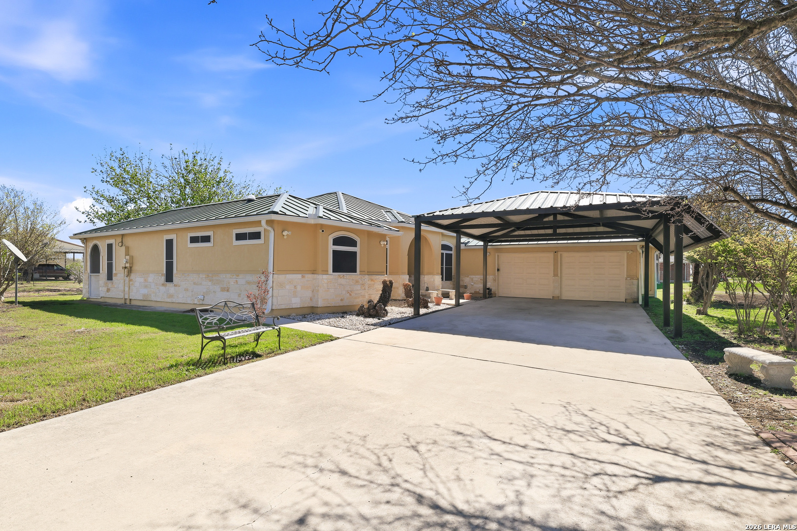 11421 Ware Seguin Road Schertz, TX 78154 - Photo 6 of 39 a front view of a house with a yard and garage