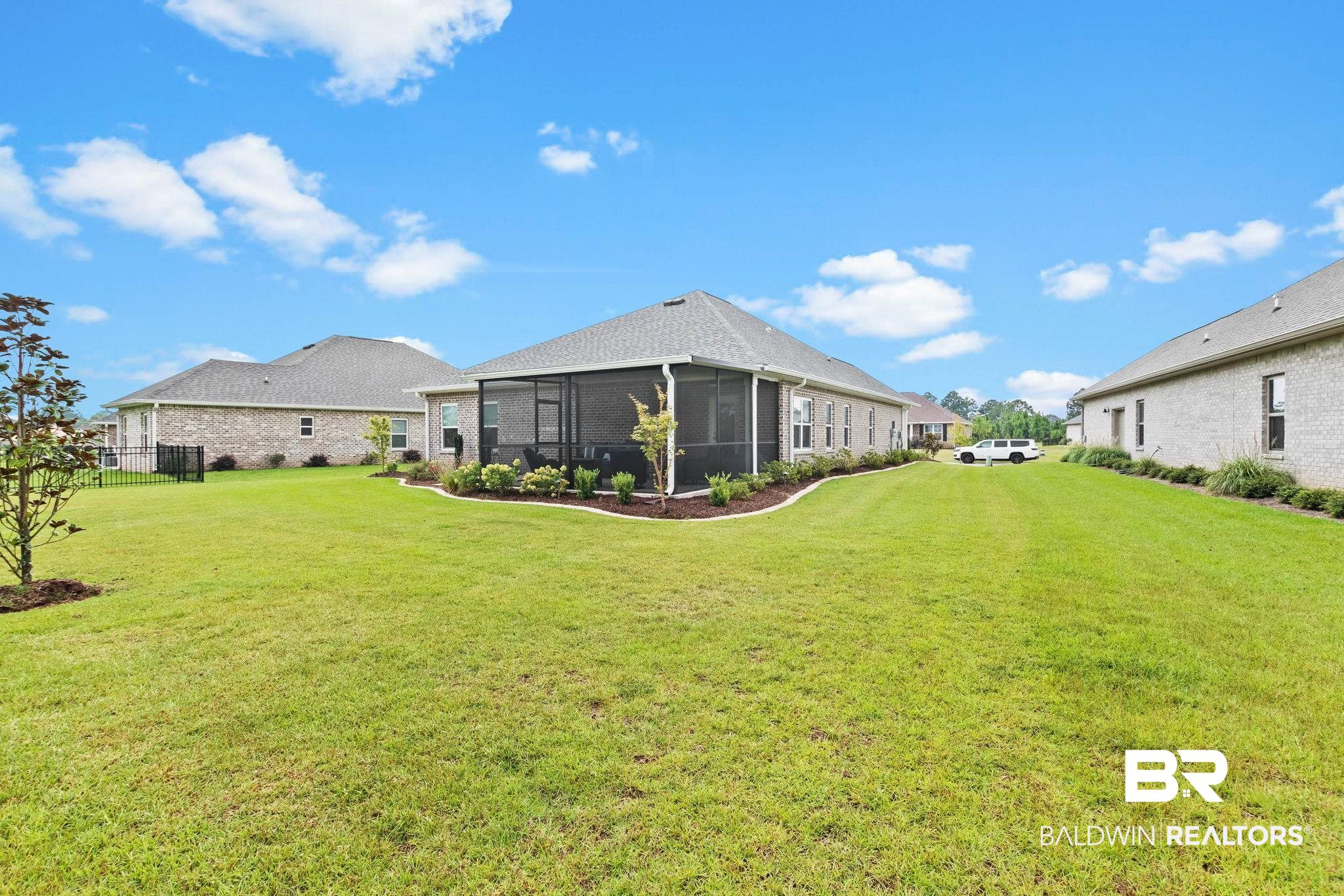 9815 Lakeview Drive Foley, AL 36535 - Photo 67 of 100 View of yard with a sunroom