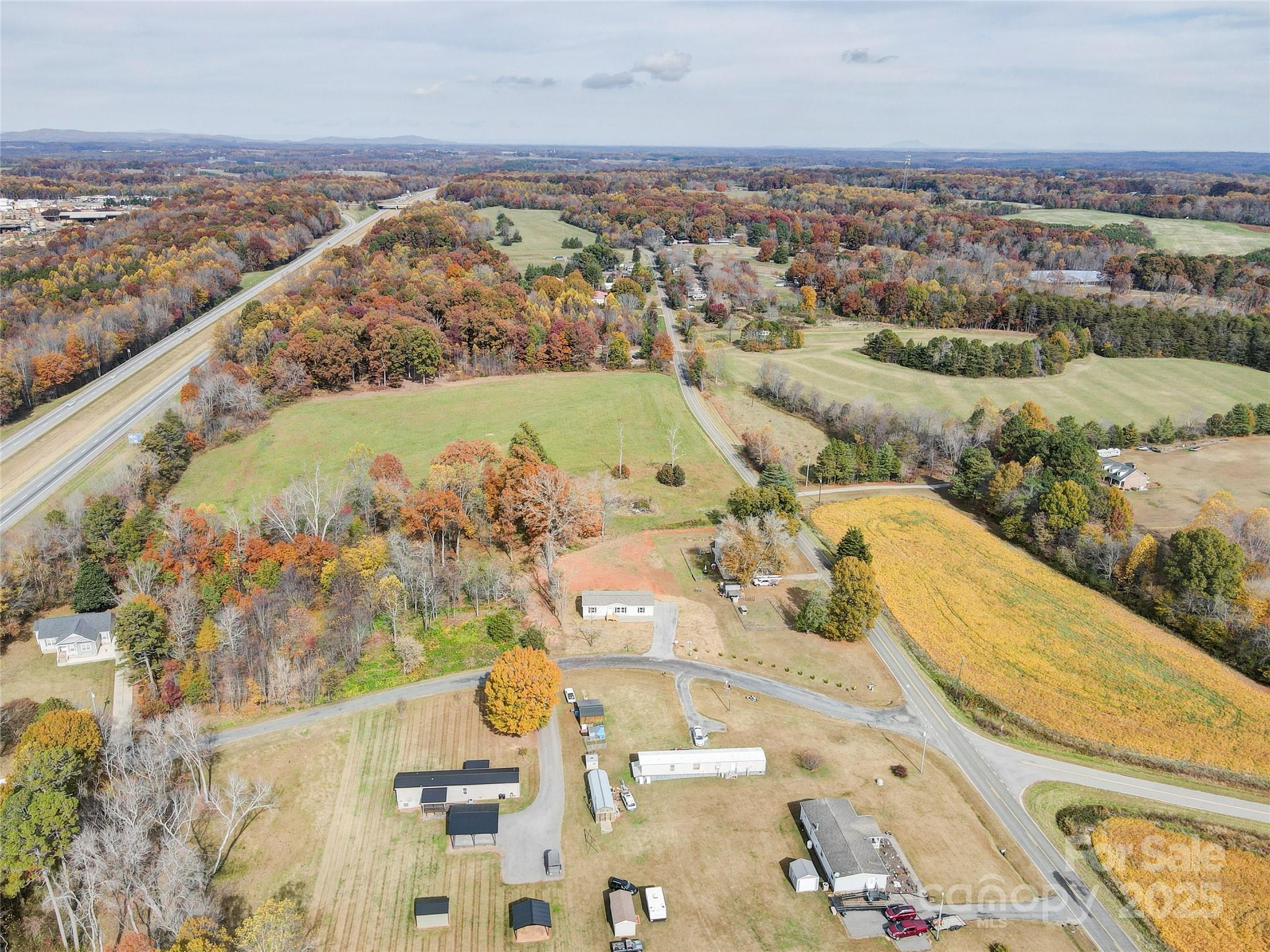 516 Lake Mullis Road Harmony, NC 28634 - Photo 14 of 28 an aerial view of a house with a outdoor space