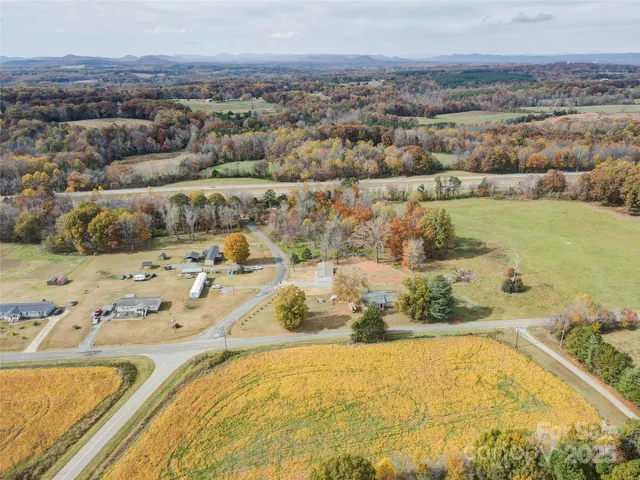 a view of swimming pool with a yard