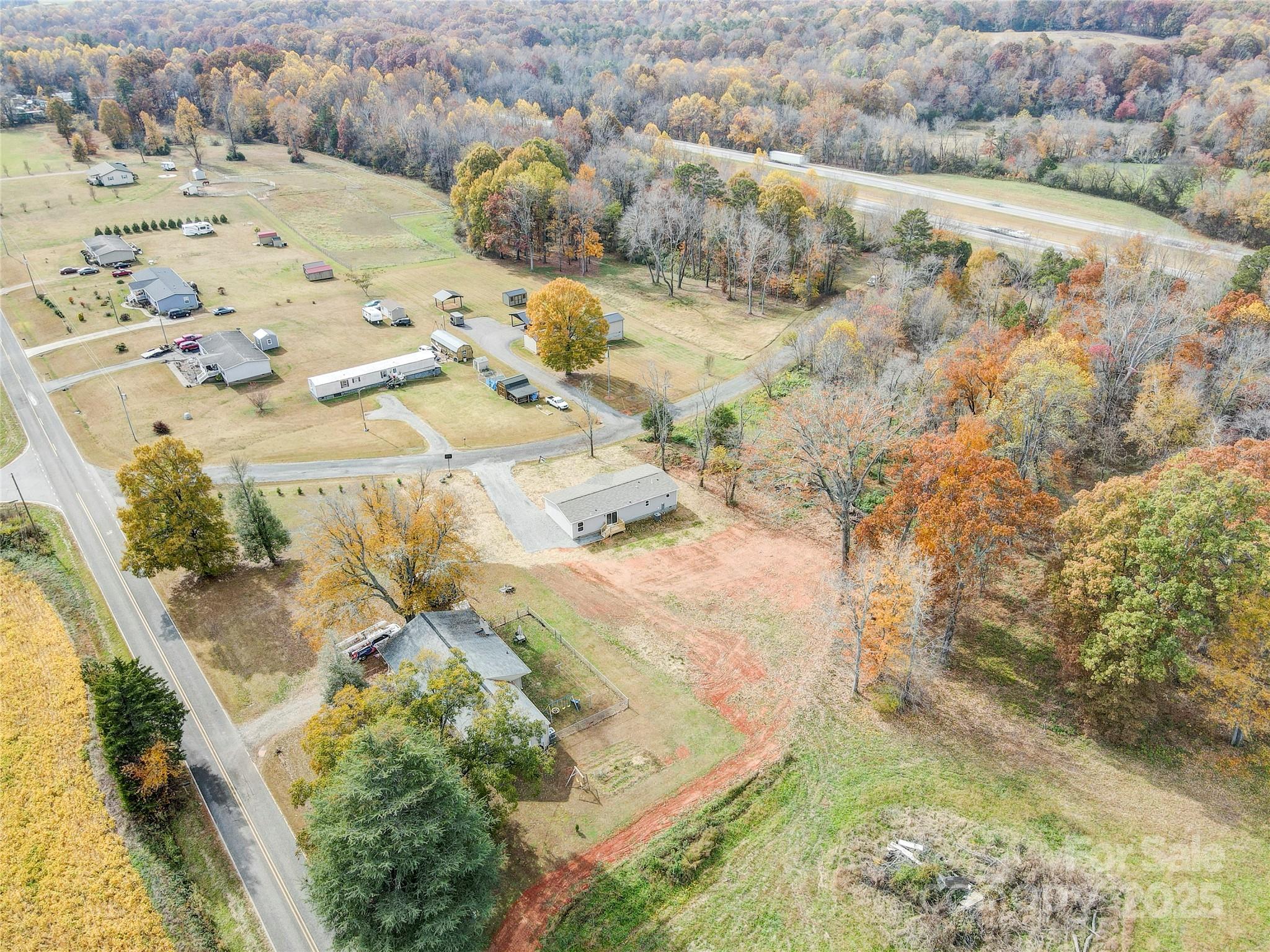 516 Lake Mullis Road Harmony, NC 28634 - Photo 20 of 28 a view of swimming pool with a yard