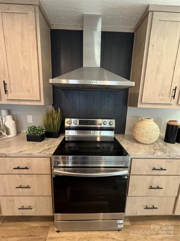 a living room with granite countertop furniture and a window