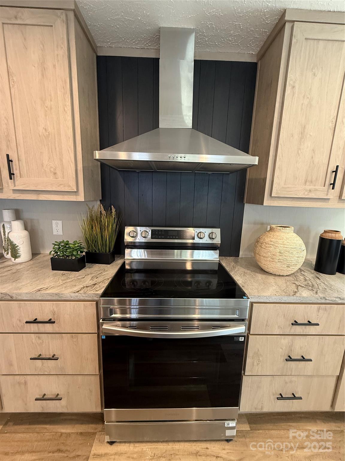 516 Lake Mullis Road Harmony, NC 28634 - Photo 4 of 28 a stove top oven sitting inside of a kitchen