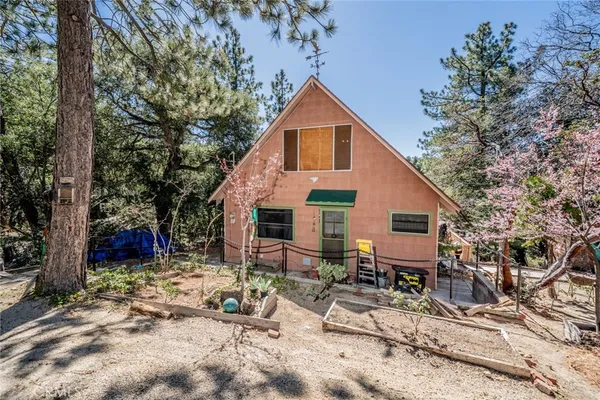 a view of backyard with a patio