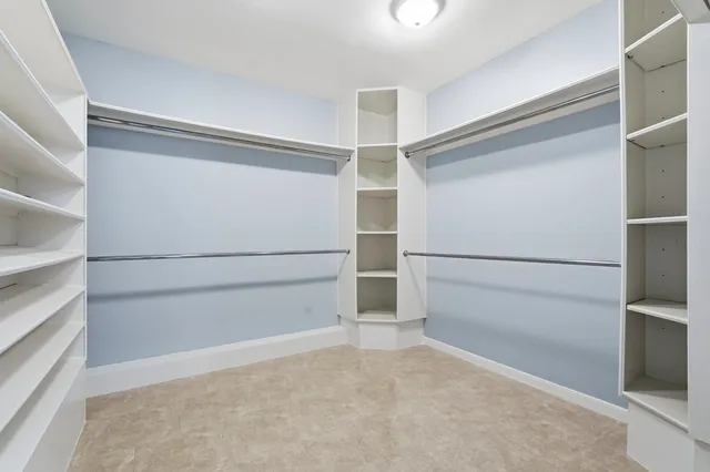 a view of an empty walk in closet