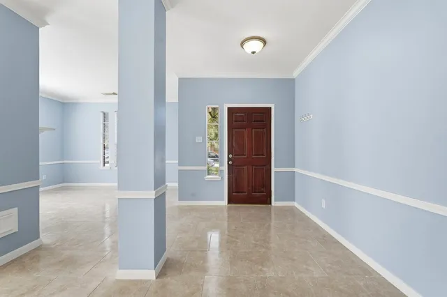 an empty room with closet and cabinet