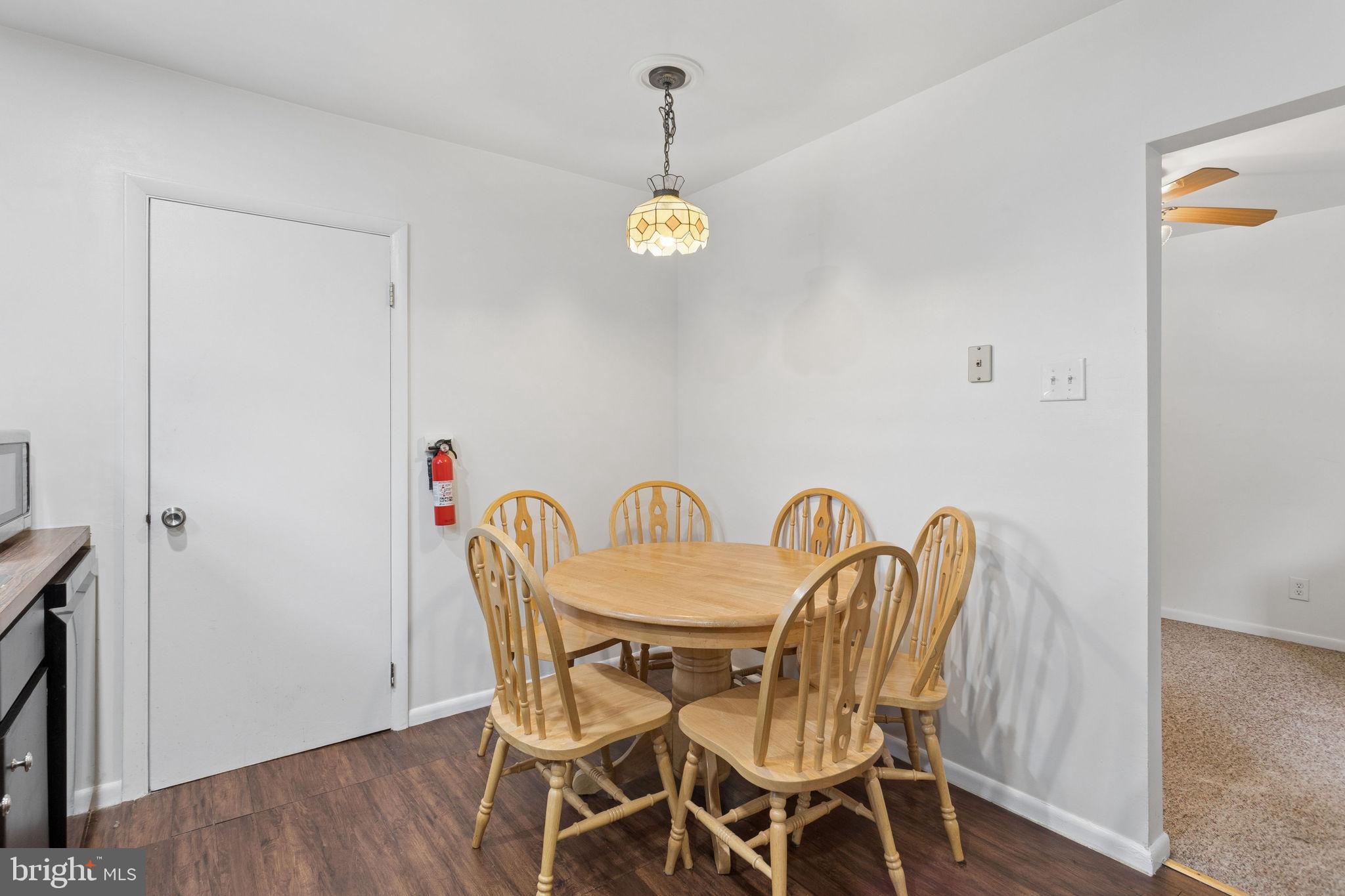1475 Mt Holly Road, Unit R3 Edgewater Park, NJ 08010 - Photo 11 of 19 a view of a dining room with furniture and wooden floor
