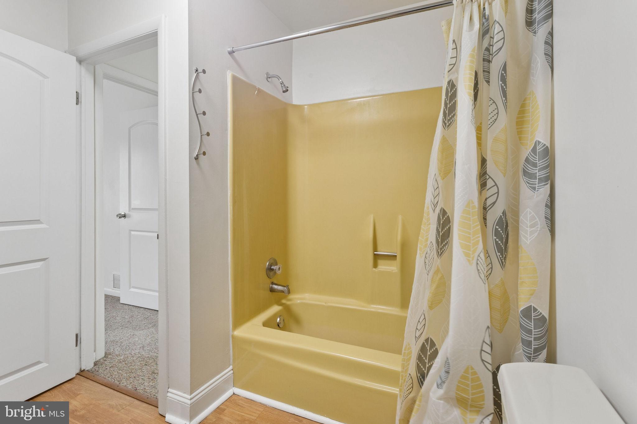1475 Mt Holly Road, Unit R3 Edgewater Park, NJ 08010 - Photo 17 of 19 a bathroom with a glass shower door