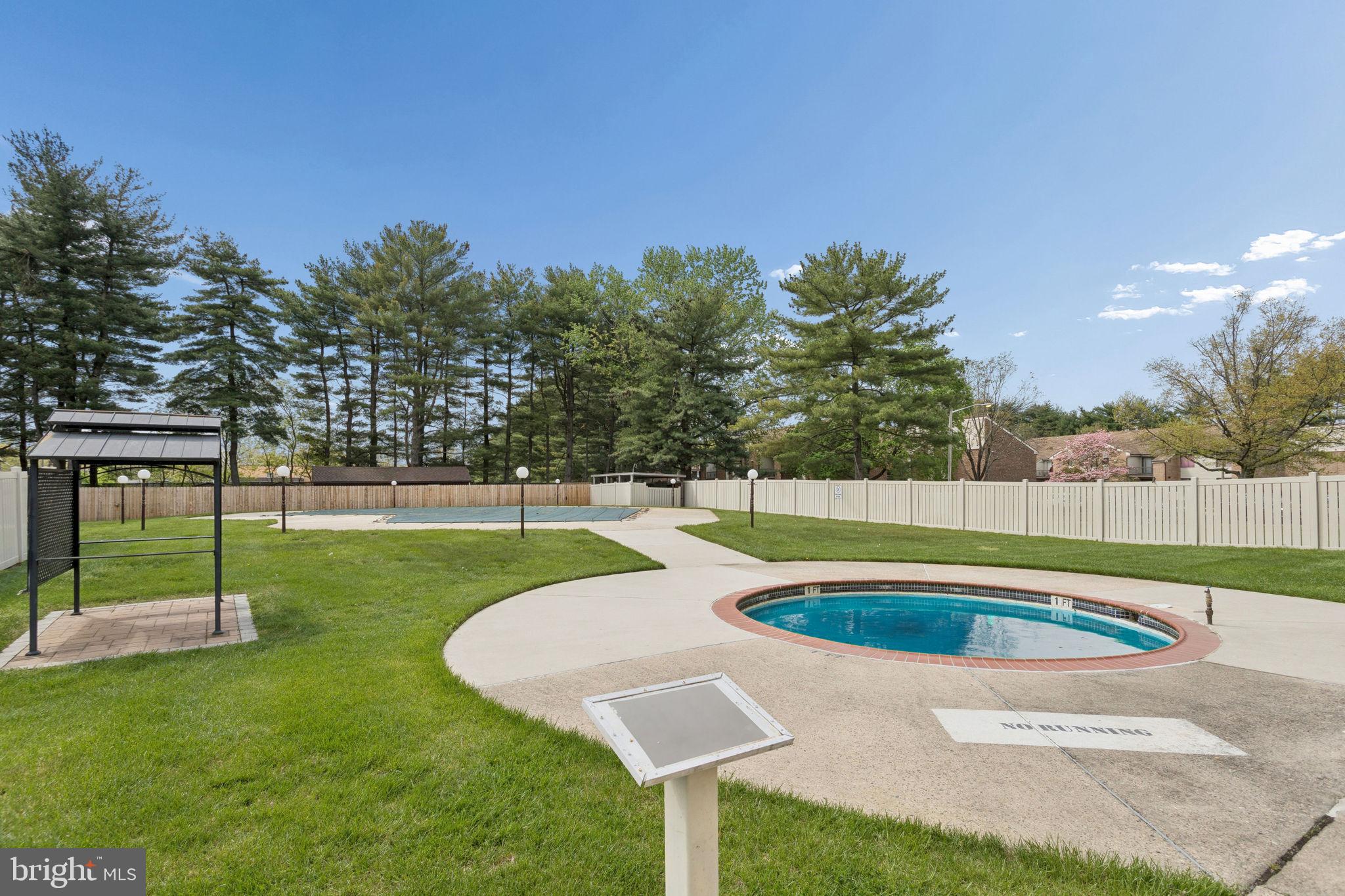 1475 Mt Holly Road, Unit R3 Edgewater Park, NJ 08010 - Photo 19 of 19 a view of a swimming pool and a yard