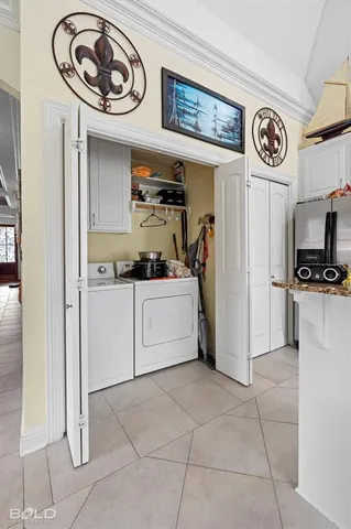 a kitchen with a stove and a refrigerator