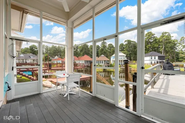 a work room with wooden floor and furniture