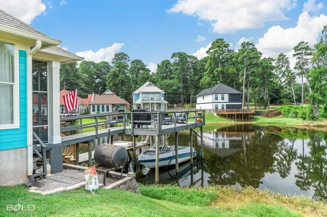an outdoor space with furniture and garden