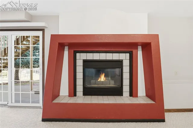 a room with fireplace and a fireplace