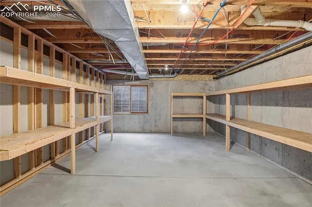 a view of an empty room with stairs