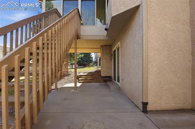 a view of staircase with wooden floor and stairs