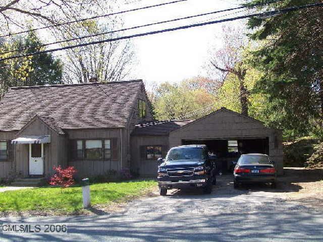 135 Edgemoor Road Bridgeport, CT 06606 - Photo 1 of 1 a car parked in front of a house