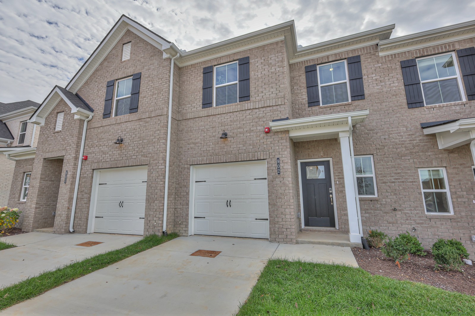 204 Douglas Bend Road, Unit 902 Gallatin, TN 37066 - Photo 3 of 32 front view of a house with a yard