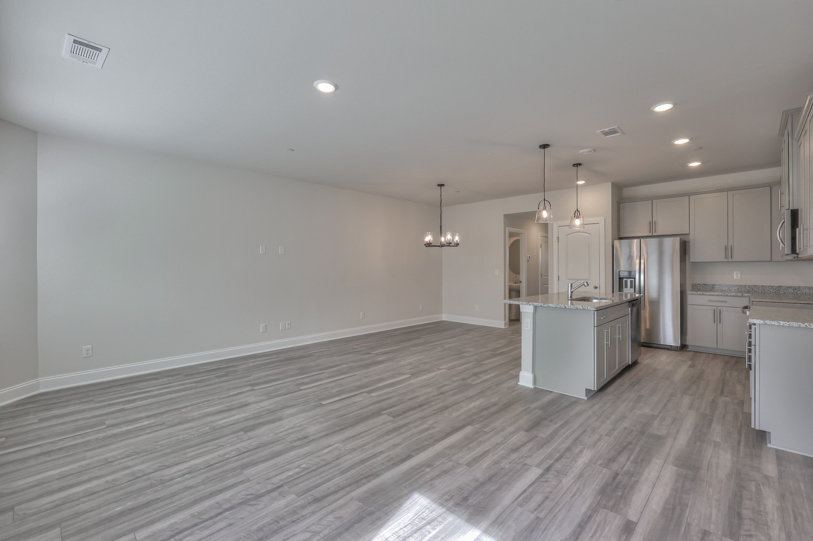204 Douglas Bend Road, Unit 902 Gallatin, TN 37066 - Photo 10 of 32 a view of kitchen with wooden floor