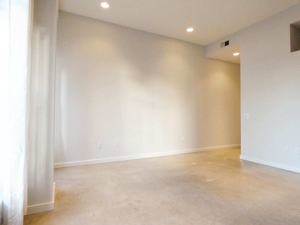 507 Sabine Street, Unit 704 Austin, TX 78701 - Photo 6 of 19 Nice Neutral Paint throughout complimenting the Polished Concrete Floor also throughout for a more modern look.