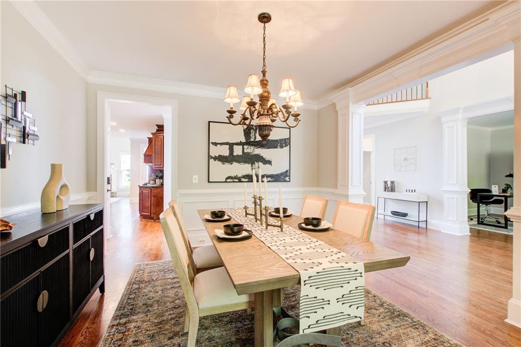 322 Tupelo Trail Canton, GA 30114 - Photo 12 of 118 a view of a dining room with furniture window and wooden floor