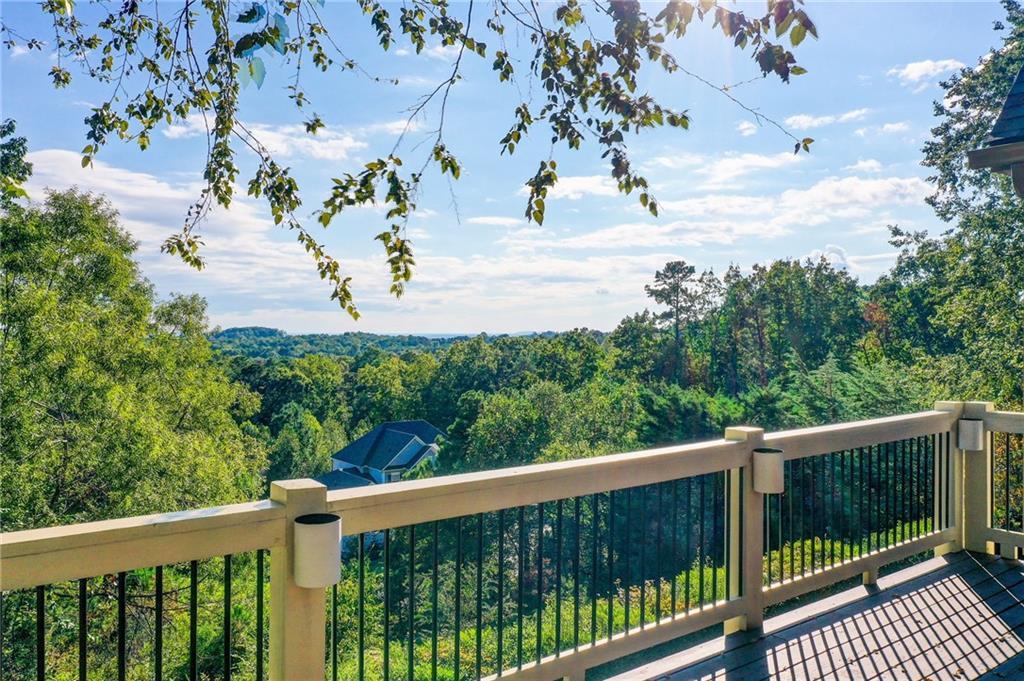 322 Tupelo Trail Canton, GA 30114 - Photo 19 of 118 a view of a balcony with wooden floor