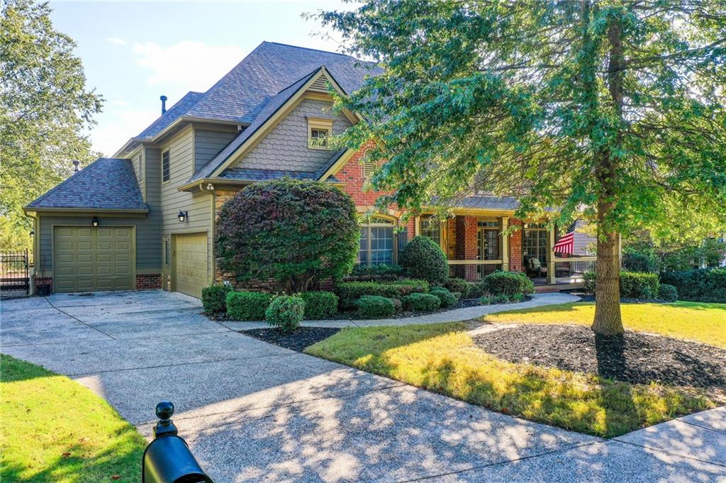 322 Tupelo Trail Canton, GA 30114 - Photo 2 of 118 a front view of a house with a yard