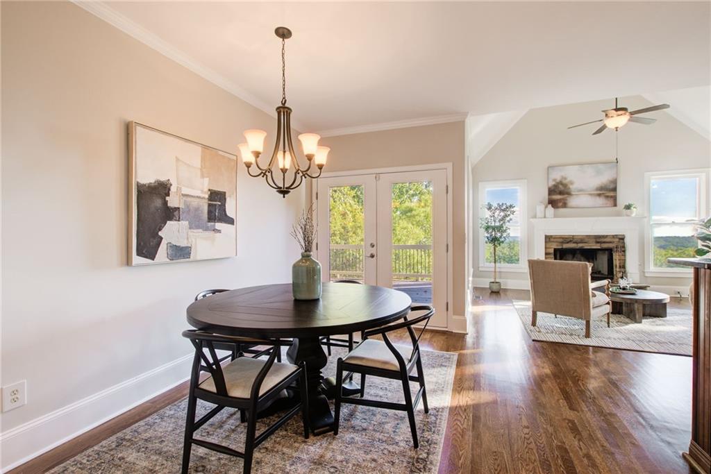 322 Tupelo Trail Canton, GA 30114 - Photo 21 of 118 a view of a dining room with furniture window and wooden floor