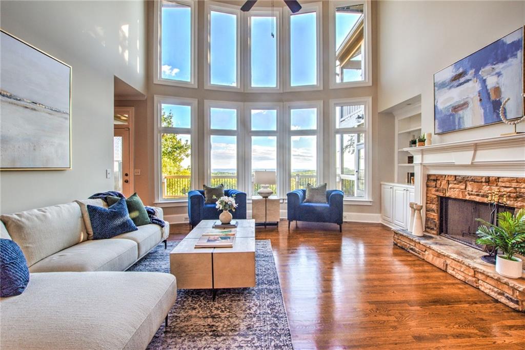 322 Tupelo Trail Canton, GA 30114 - Photo 33 of 118 a living room with furniture and a fireplace