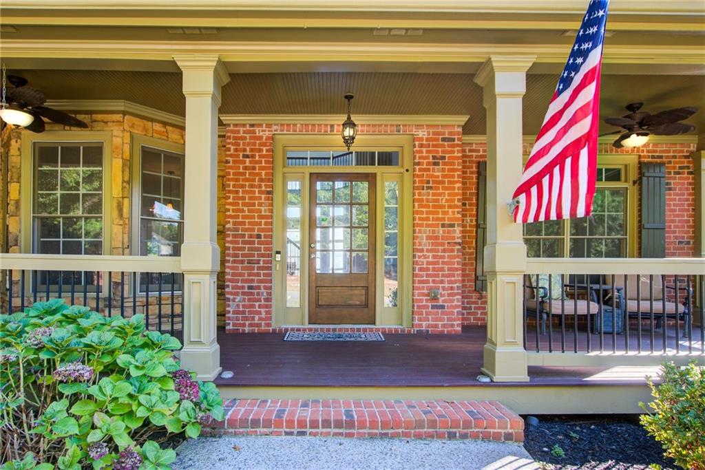 322 Tupelo Trail Canton, GA 30114 - Photo 5 of 118 a front view of a building with outdoor seating