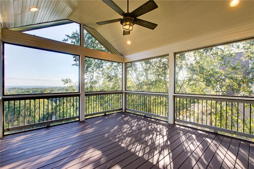 322 Tupelo Trail Canton, GA 30114 - Photo 65 of 118 a view of a porch with wooden floor