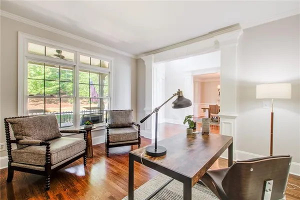 a kitchen with stainless steel appliances granite countertop a stove and a wooden floors