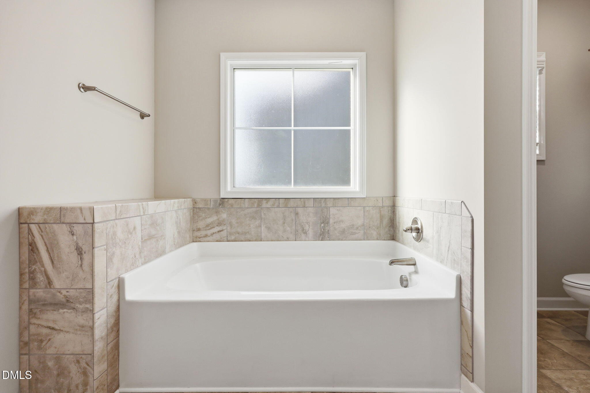 3017 Branscombe Road Fayetteville, NC 28304 - Photo 15 of 43 a white bath tub sitting next to a window