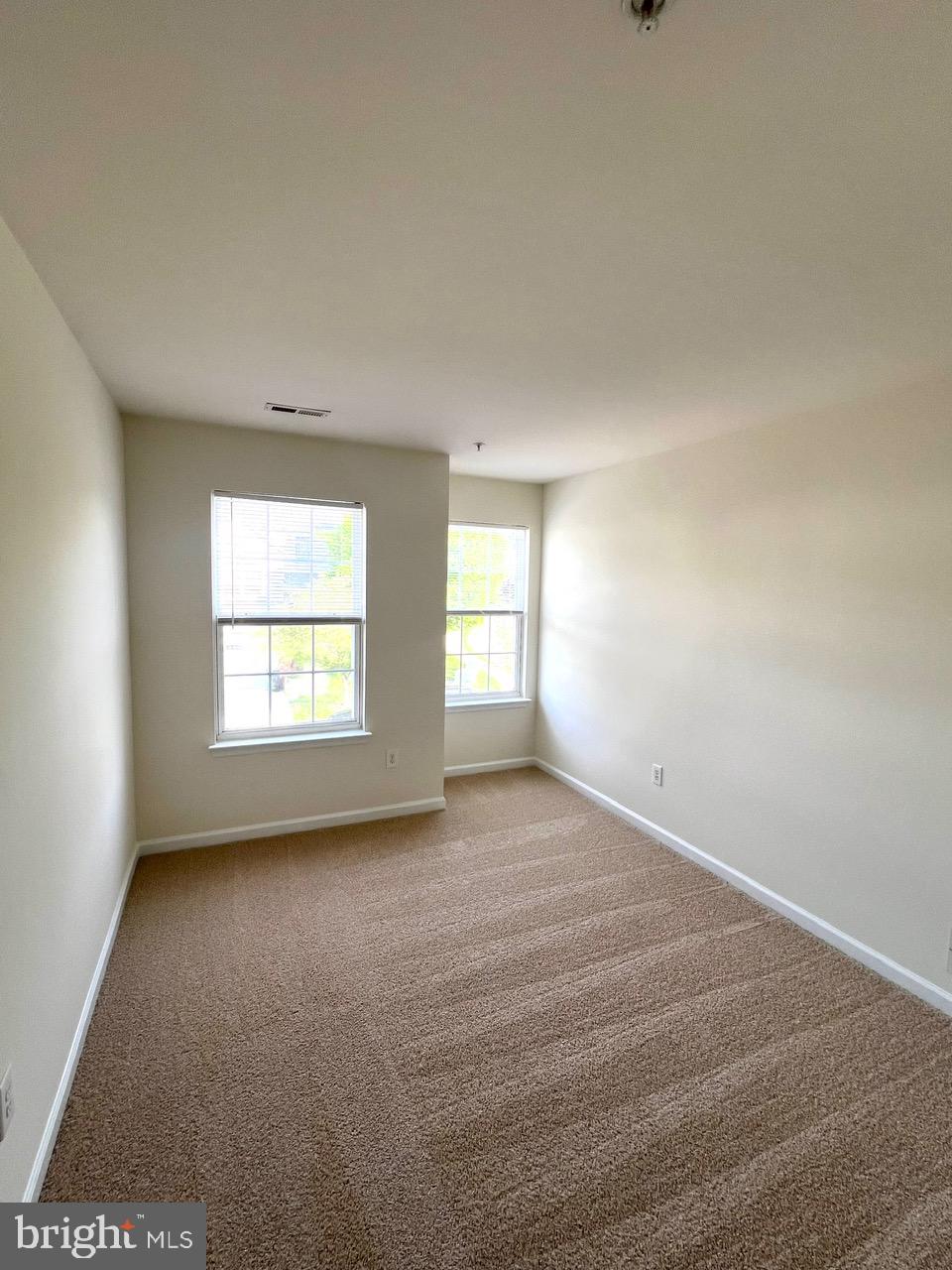 9702 Evening Bird Lane Laurel, MD 20723 - Photo 14 of 28 a view of an empty room with a window