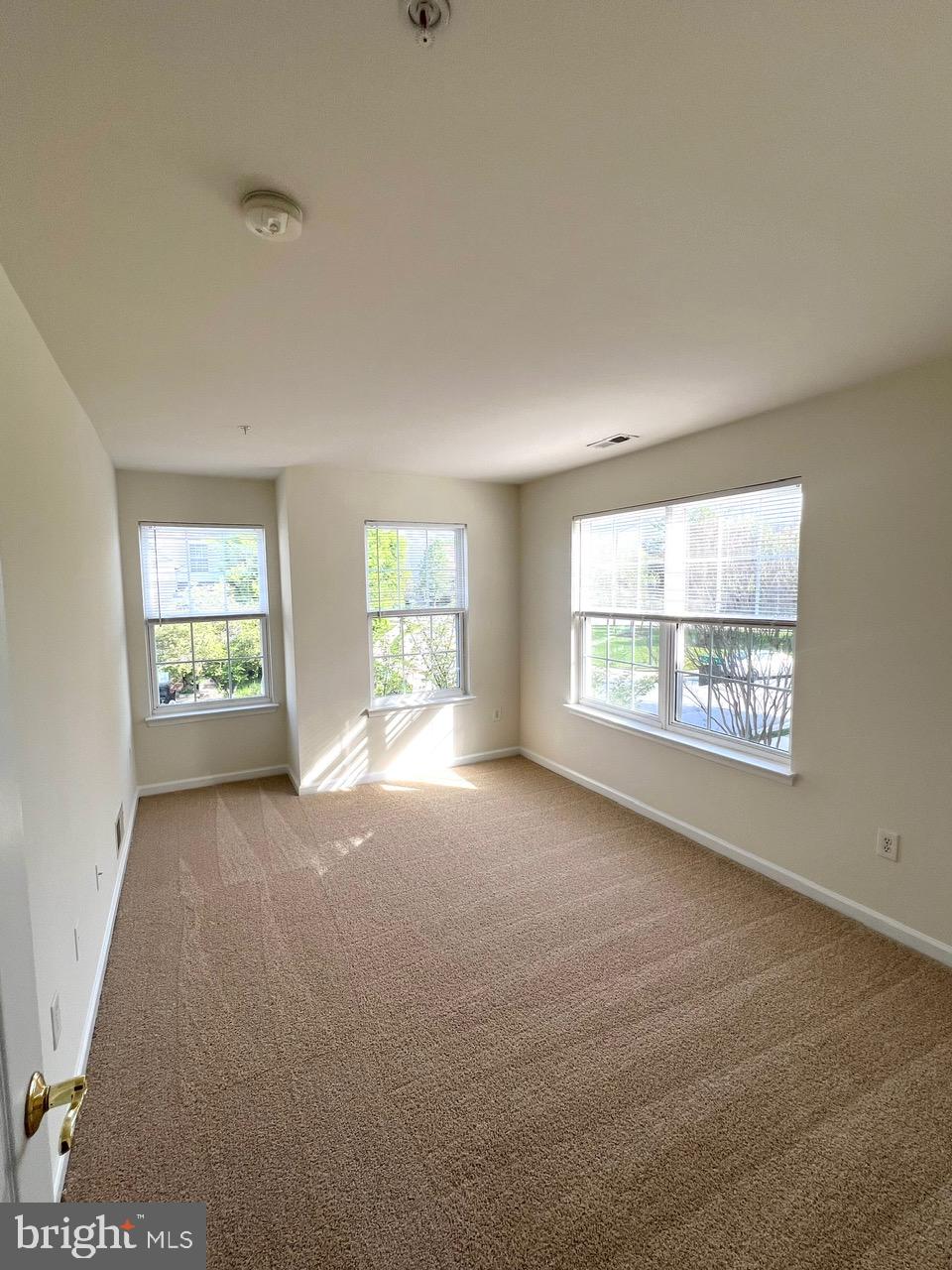 9702 Evening Bird Lane Laurel, MD 20723 - Photo 15 of 28 a view of an empty room with a window