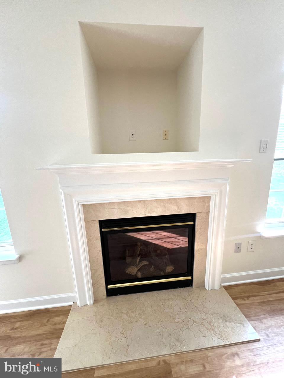 9702 Evening Bird Lane Laurel, MD 20723 - Photo 17 of 28 a living room with a fireplace