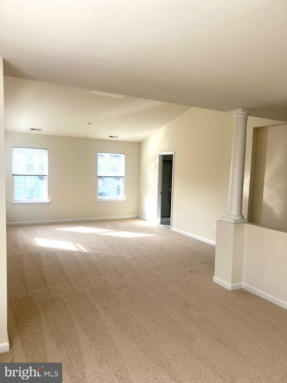 9702 Evening Bird Lane Laurel, MD 20723 - Photo 19 of 28 an empty room with windows