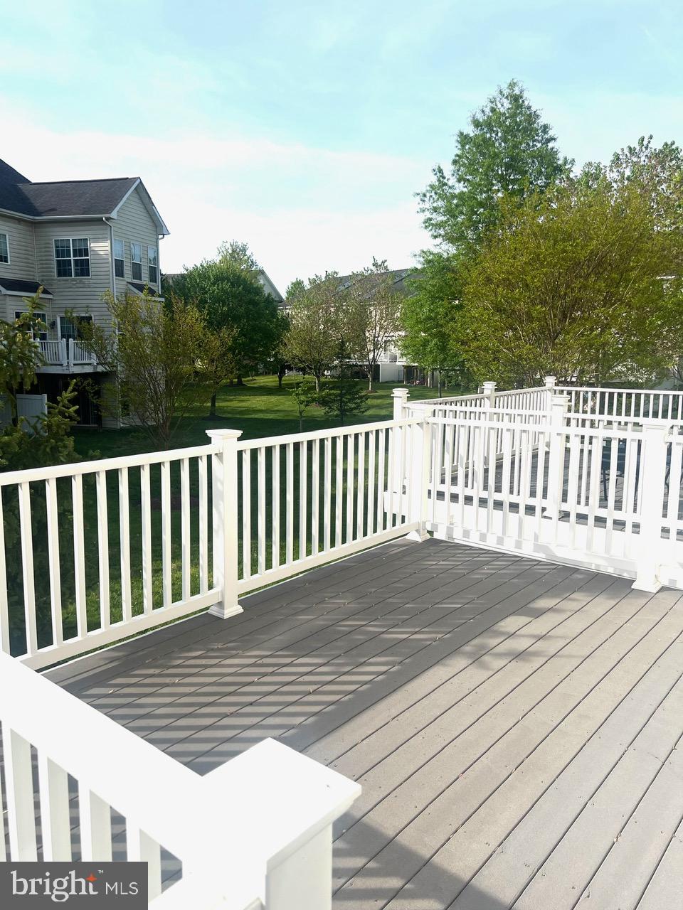 9702 Evening Bird Lane Laurel, MD 20723 - Photo 25 of 28 a view of a wooden roof deck