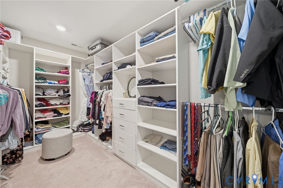 7598 Rural Point Road Mechanicsville, VA 23116 - Photo 26 of 41 a view of walk in closet with clothes and shoes