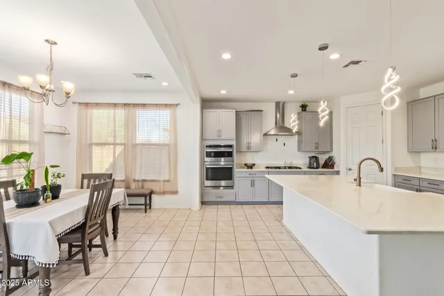 a view of a a dining room with furniture window and outside view