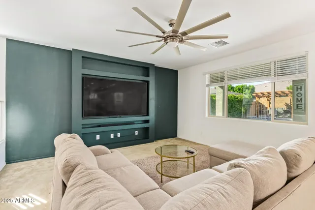 a bathroom with a toilet a sink and a mirror
