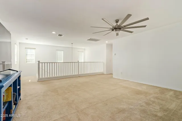 a view of a building with sitting area