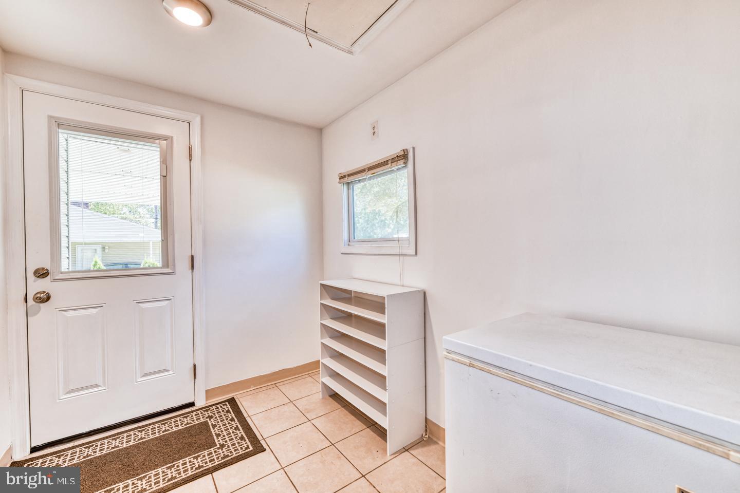 12 Goodturn Road Levittown, PA 19057 - Photo 6 of 20 a view of an empty room with a window