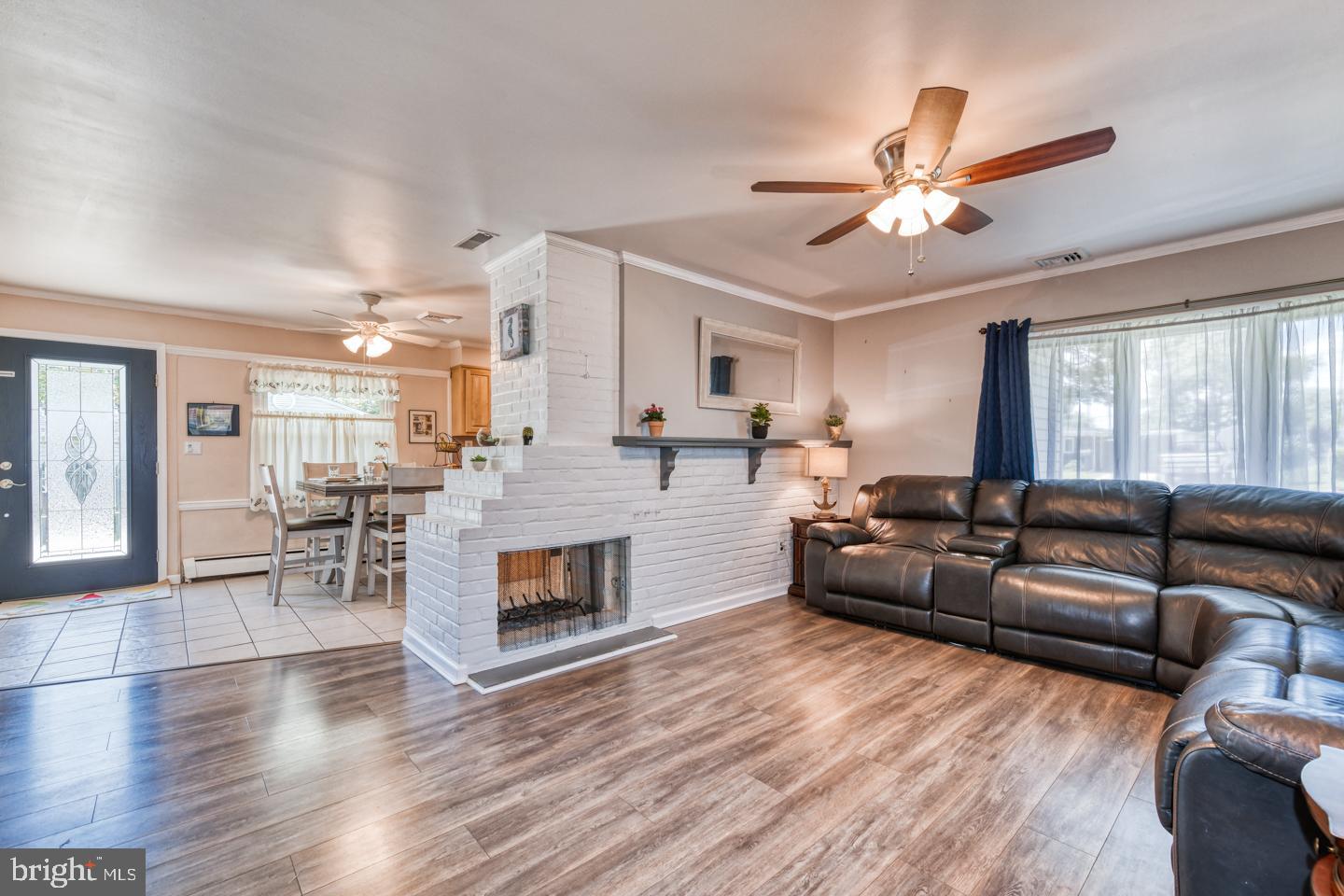 12 Goodturn Road Levittown, PA 19057 - Photo 8 of 20 a living room with furniture and a fireplace