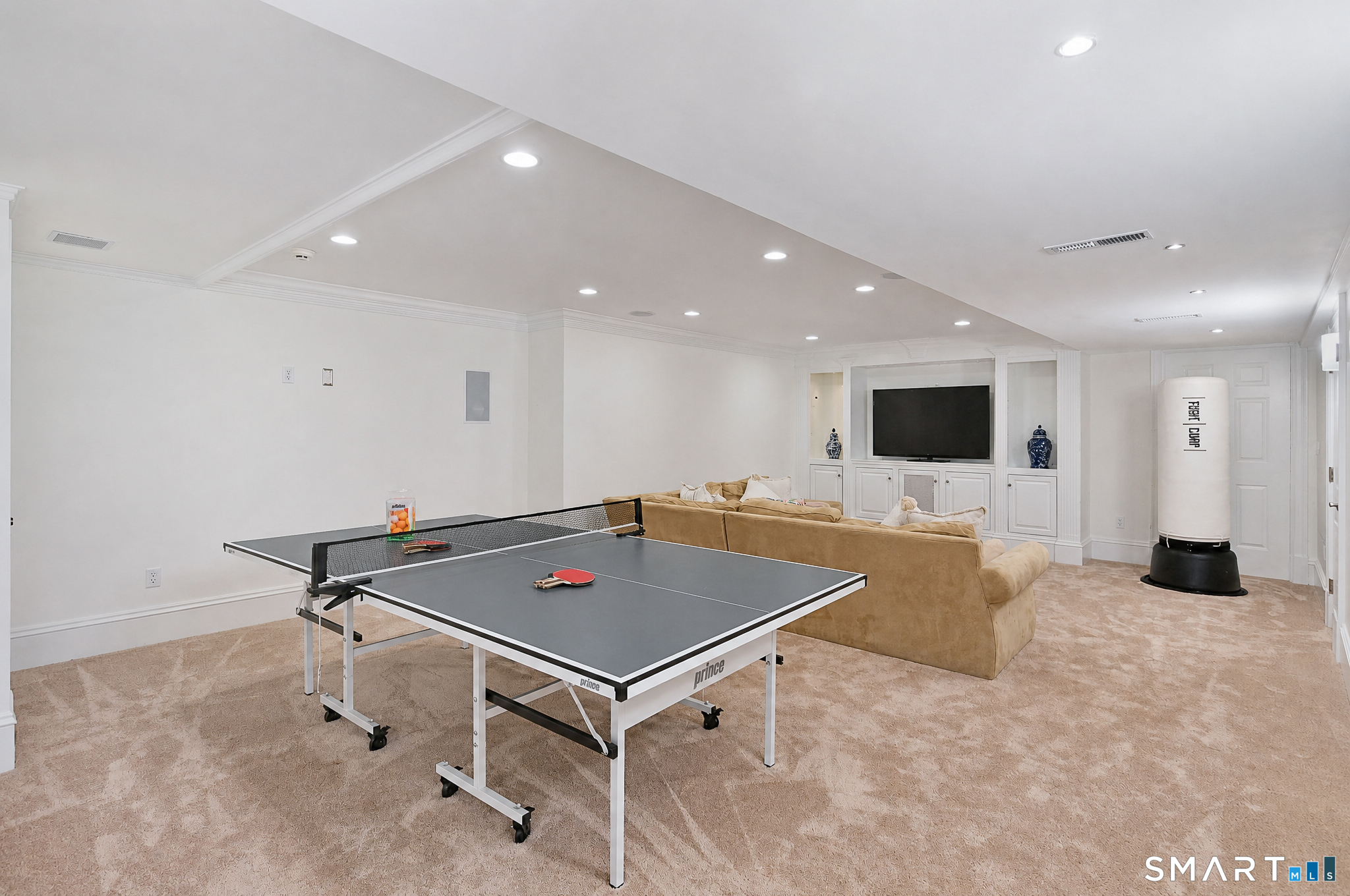 17 Kent Road Newtown, CT 06470 - Photo 31 of 40 Large recreation room with space for games and relaxing.