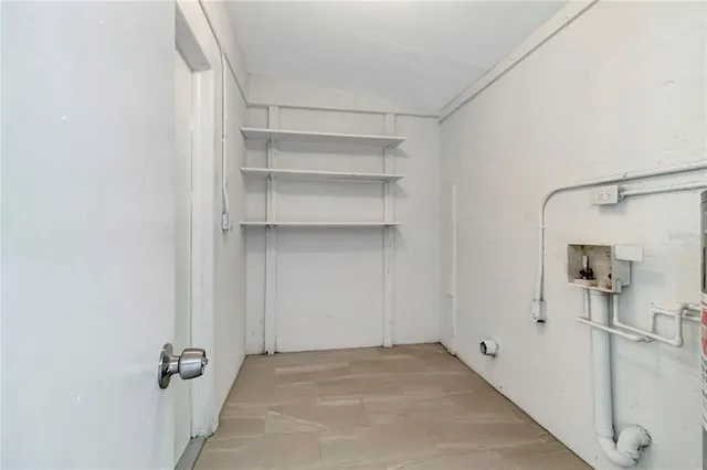 a view of a walk in closet