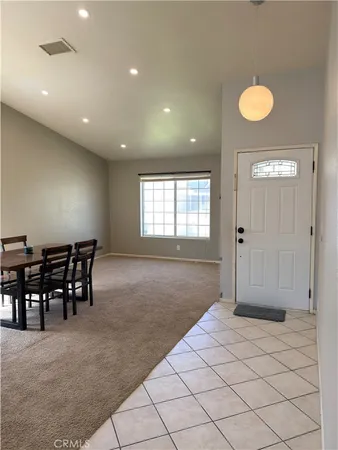 a view of a room with windows