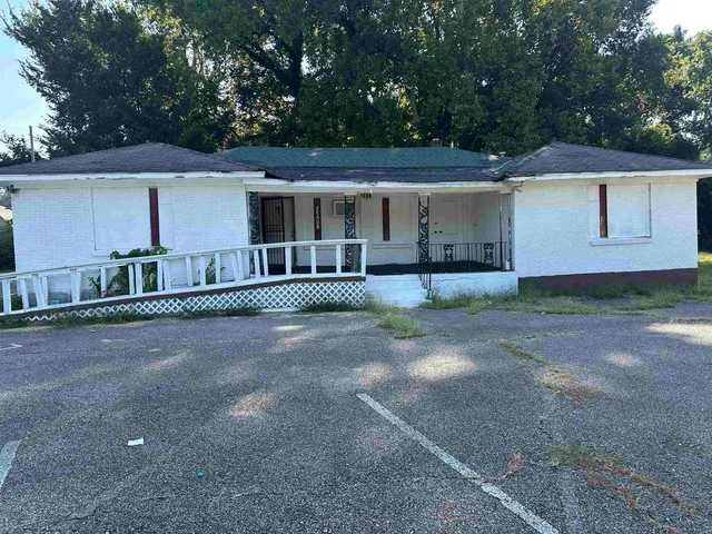 front view of a house with a street
