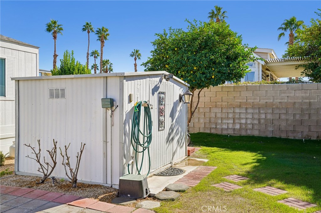 81620 Ave 49, Unit 174 Indio, CA 92201 - Photo 27 of 37 a view of a potted plants in front of house